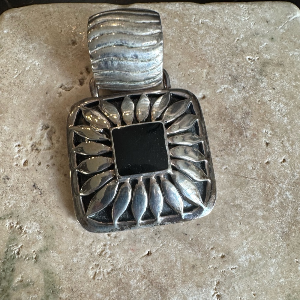 Silver Pendant with Wave Design